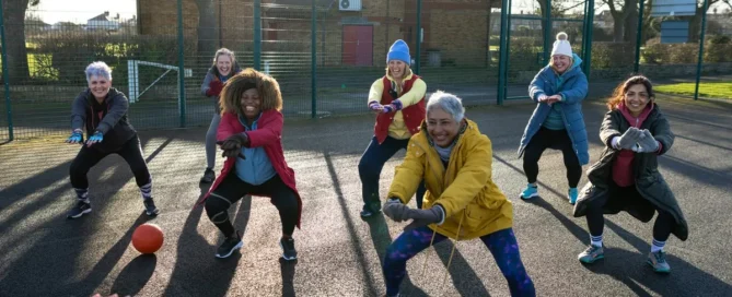 What is assisted living: seniors enjoy outdoor group exercise and social activities